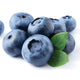 Front view of Bluecrop blueberry showcasing large light-blue berry cluster on white background
