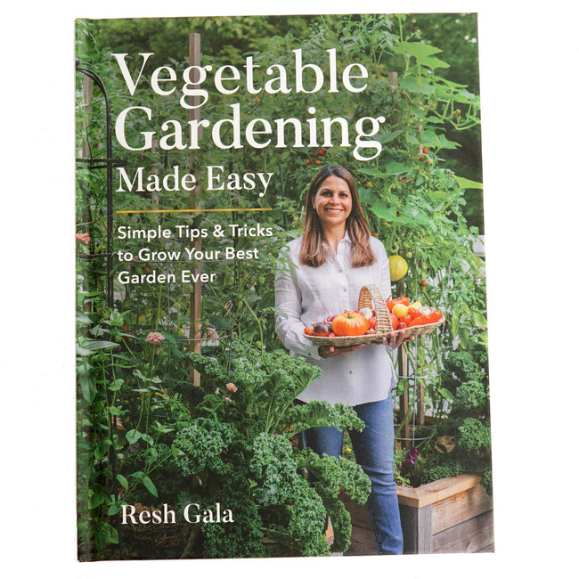 Front cover of the book Vegetable Gardening Made Easy showing author Resh Gala holding a basket of vegetables in a raised-bed garden