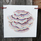 Colorful mushroom flag illustration on a wooden background