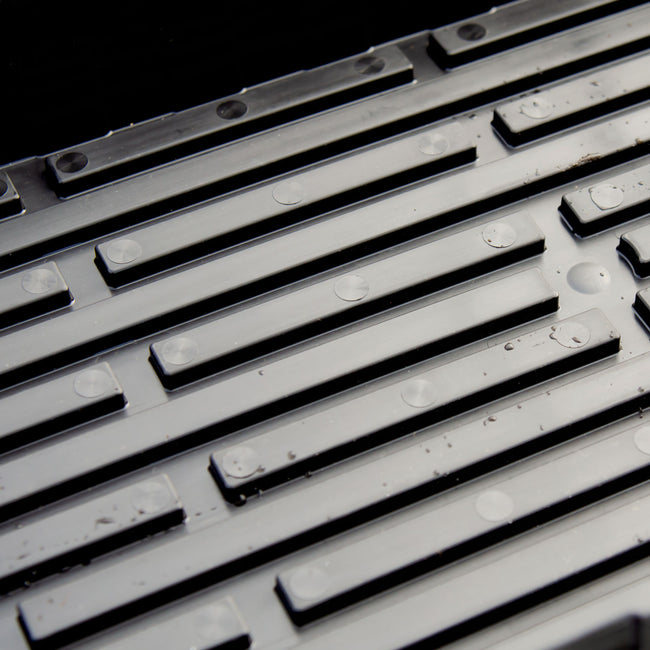 Top view of SUNPACK MEGA Color I.D. tray showcasing the grid of planting cells on a white background