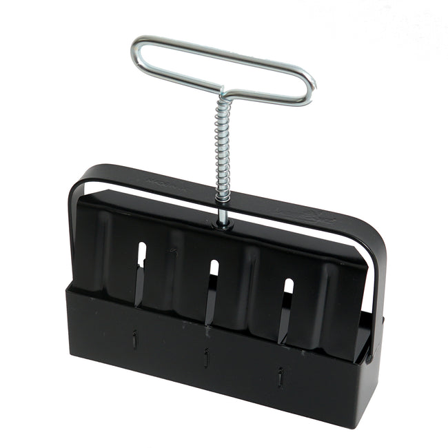 Black metal soil blocker tool with a handle on a white background