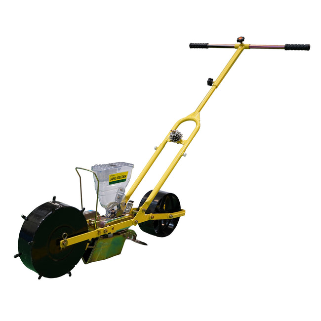 Three-quarter view of Jang One Row Push Seeder showing yellow seed roller, black wheels, and adjustable handle on white background