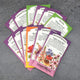 Front view of Everlasting Flower Garden Kit seed packets fanned to show colorful packet artwork on light background