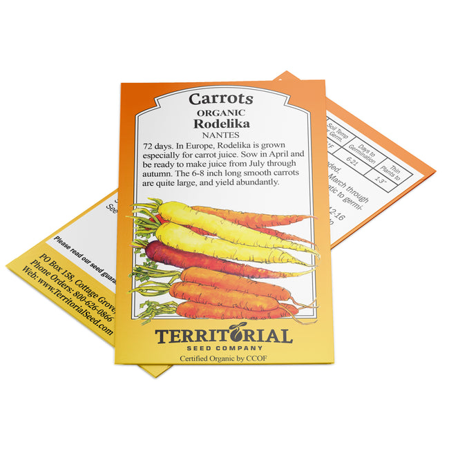Front view of Rodelika Carrot seed packet showcasing illustrated orange Nantes carrots and the words Organic Seed 1 gram on a white background