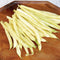 Close-up of Gold Rush wax beans showcasing lemon-yellow pods on a wooden surface