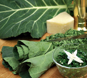 Close-up of Flash collard leaves showcasing smooth, broad dark green foliage on white background