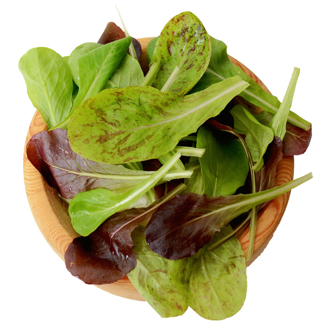 Top view of Heat Tolerant Lettuce Mix in wooden bowl showing green, red, and speckled romaine leaves on white background