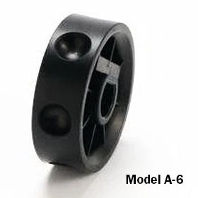 Three-quarter view of Jang Seed Roller Model A-6 showcasing black plastic roller with six seed pockets on white background