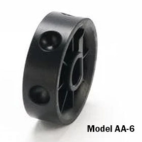 Close up of Jang Model A-6 seed roller showing black plastic wheel with two recessed seed holes on white background