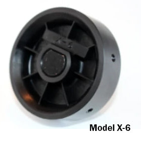 Close-up of Jang Model X-6 seed roller, black plastic circular roller with central hub and seed holes on white background