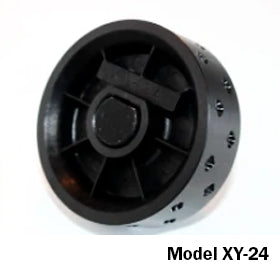 Front view of Jang Model XY-24 seed roller showing black plastic disc with circular seed holes on white background
