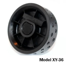 Angled view of Jang seed roller Model XY-36 showcasing perforated metering roller and central drive hub on white background