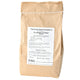 Front view of Territorial's Complete Fertilizer (dry) in a brown kraft paper bag showing the white product label on a white background