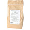 Front view of Territorial's Complete Fertilizer (dry) in a brown kraft paper bag showing the white product label on a white background