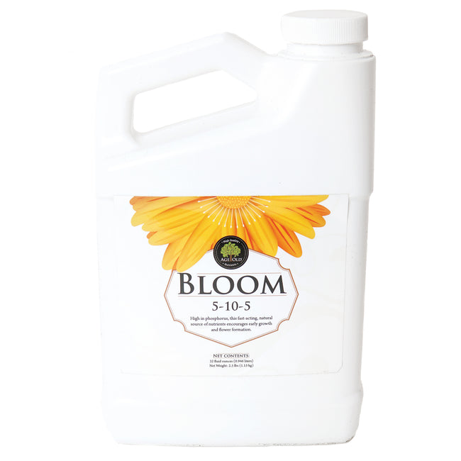 Front view of Age Old Bloom liquid fertilizer jug showcasing sunflower label and top handle on white background
