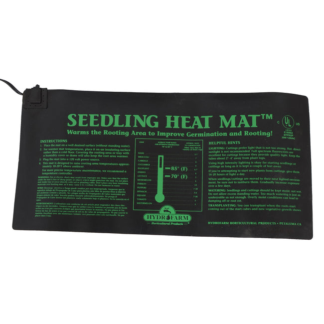 Top-down view of seedling heat mat showing green printed temperature gauge, usage instructions, and attached power cord on white background