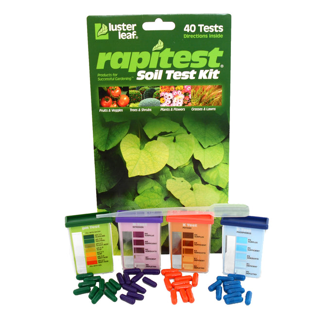 Front view of Soil Test Kit showing box with comparator card and four colored reagent capsules on white background