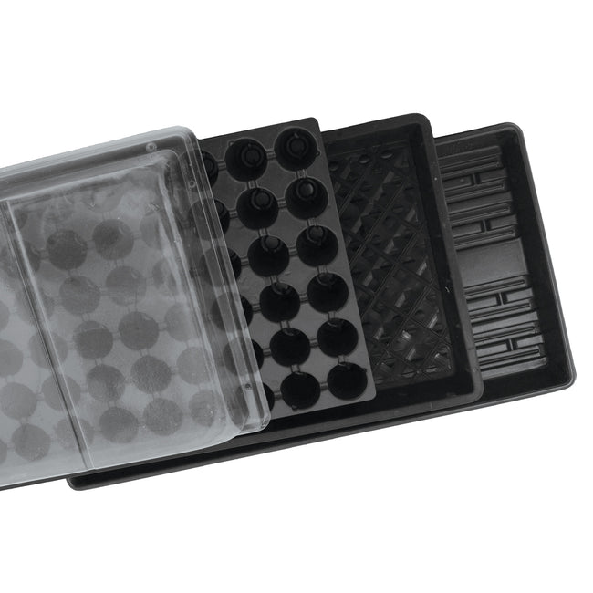 Angled top-down of propagation kit with clear dome, 50-cell insert, mesh bottom tray and utility flat on white background